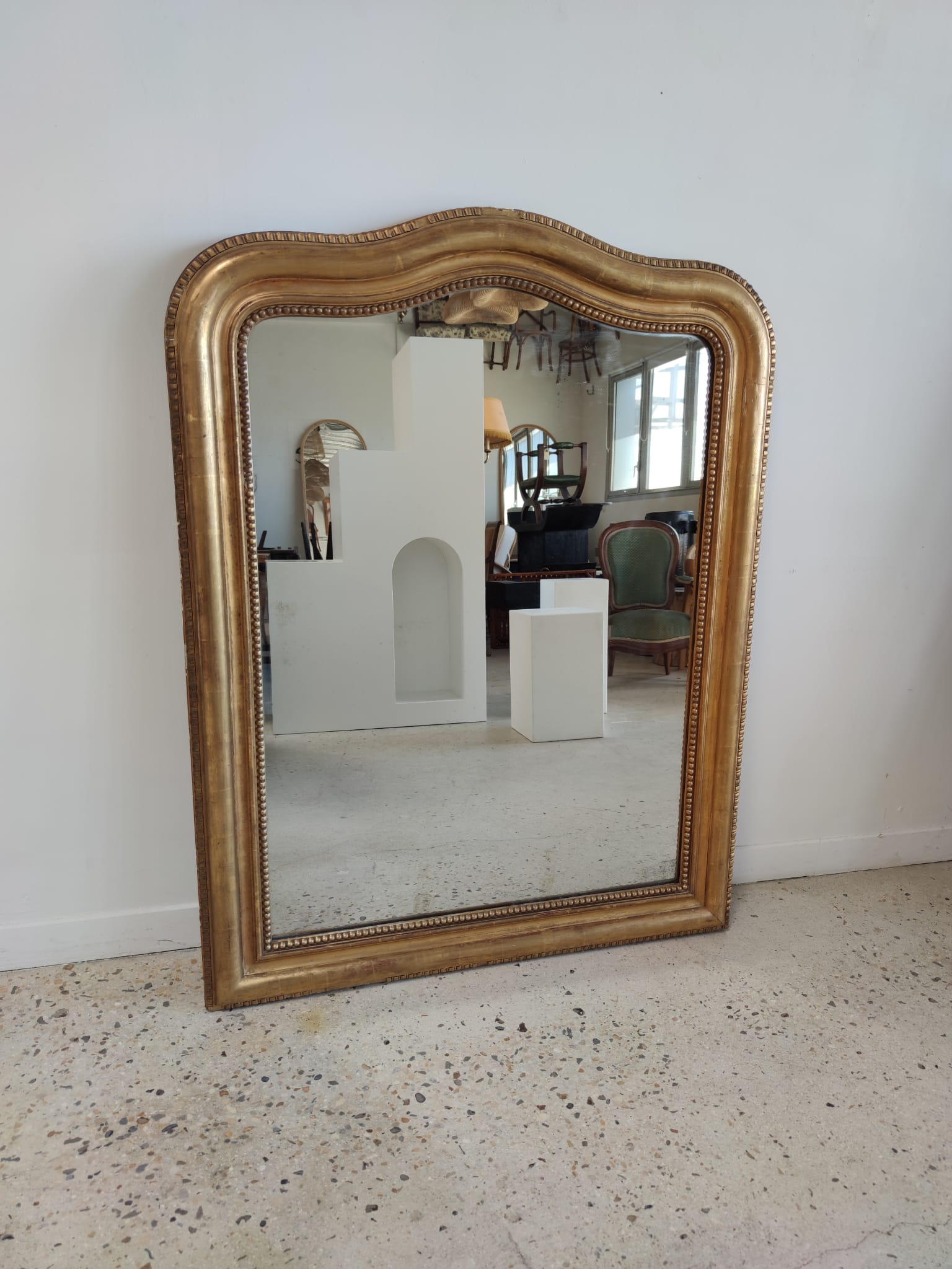Louis Philippe gilded mirror with gendarme hat nineteenth H:130cm