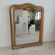 Louis Philippe gilded mirror with gendarme hat nineteenth H:130cm