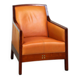Fauteuil design artdeco en cuir de vache. grand confort et détails uniques