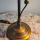 Brass articulated lamp with glass paste signed art of France.