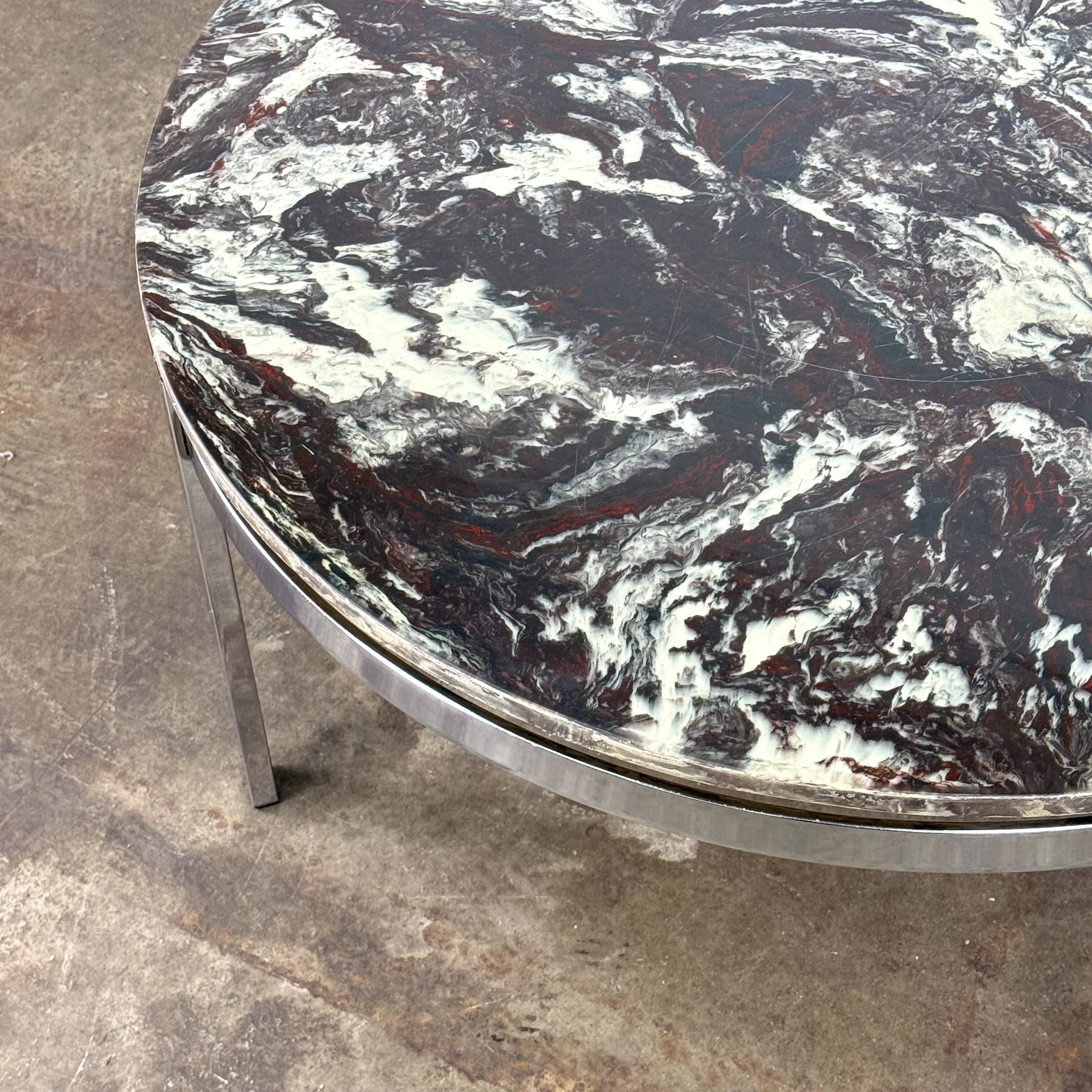 Round vintage coffee table with marble top and chrome base