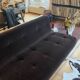 Red Edition Stanley 3-seater sofa with matching chocolate velvet storage.