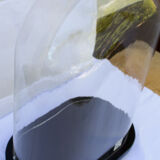 Old oval glass globe 35.5 cm high black foot