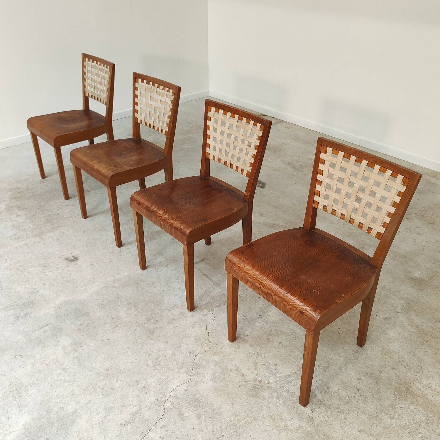 Series of 4 wood and strap chairs by Krasna Jizba Year 40