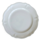 Round vintage ivory earthenware serving dish with scalloped rim.