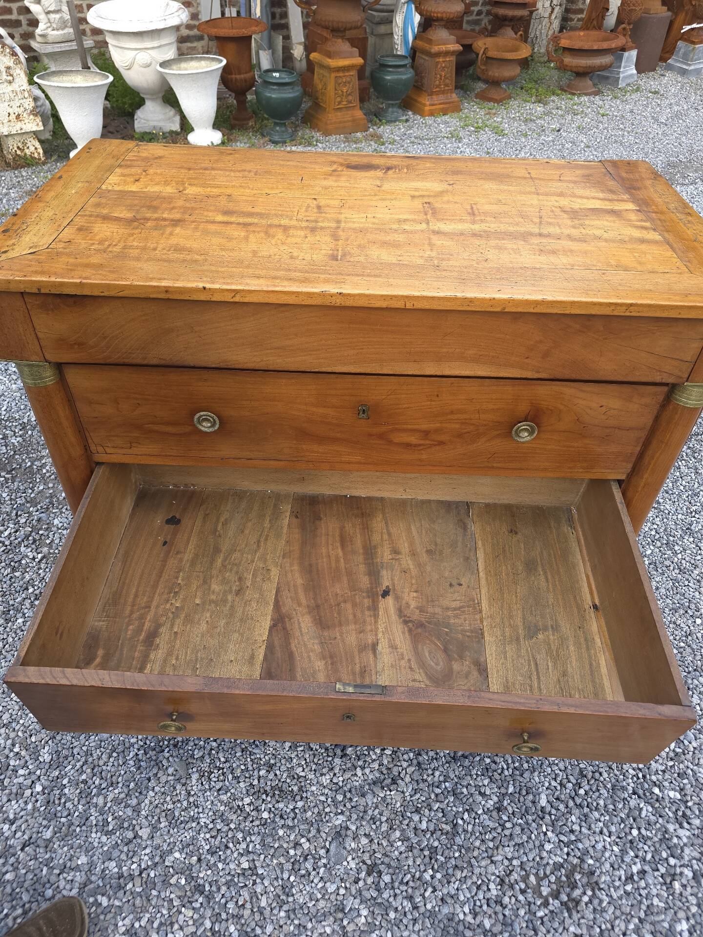 Empire style chest of drawers in cherry wood