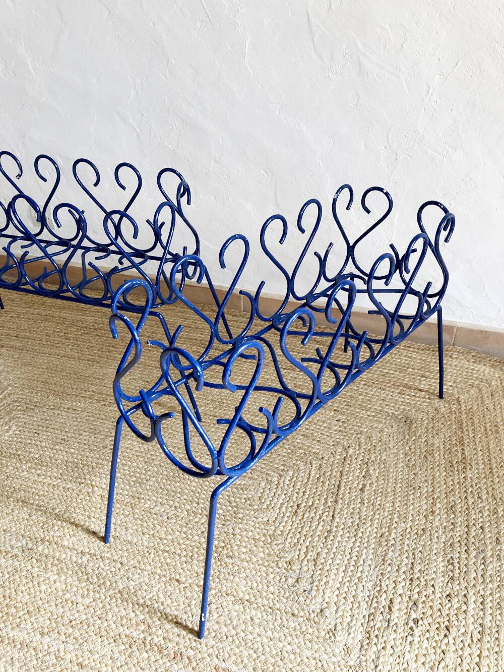 Pair of blue-painted wrought iron planters, 1960s