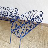 Pair of blue-painted wrought iron planters, 1960s