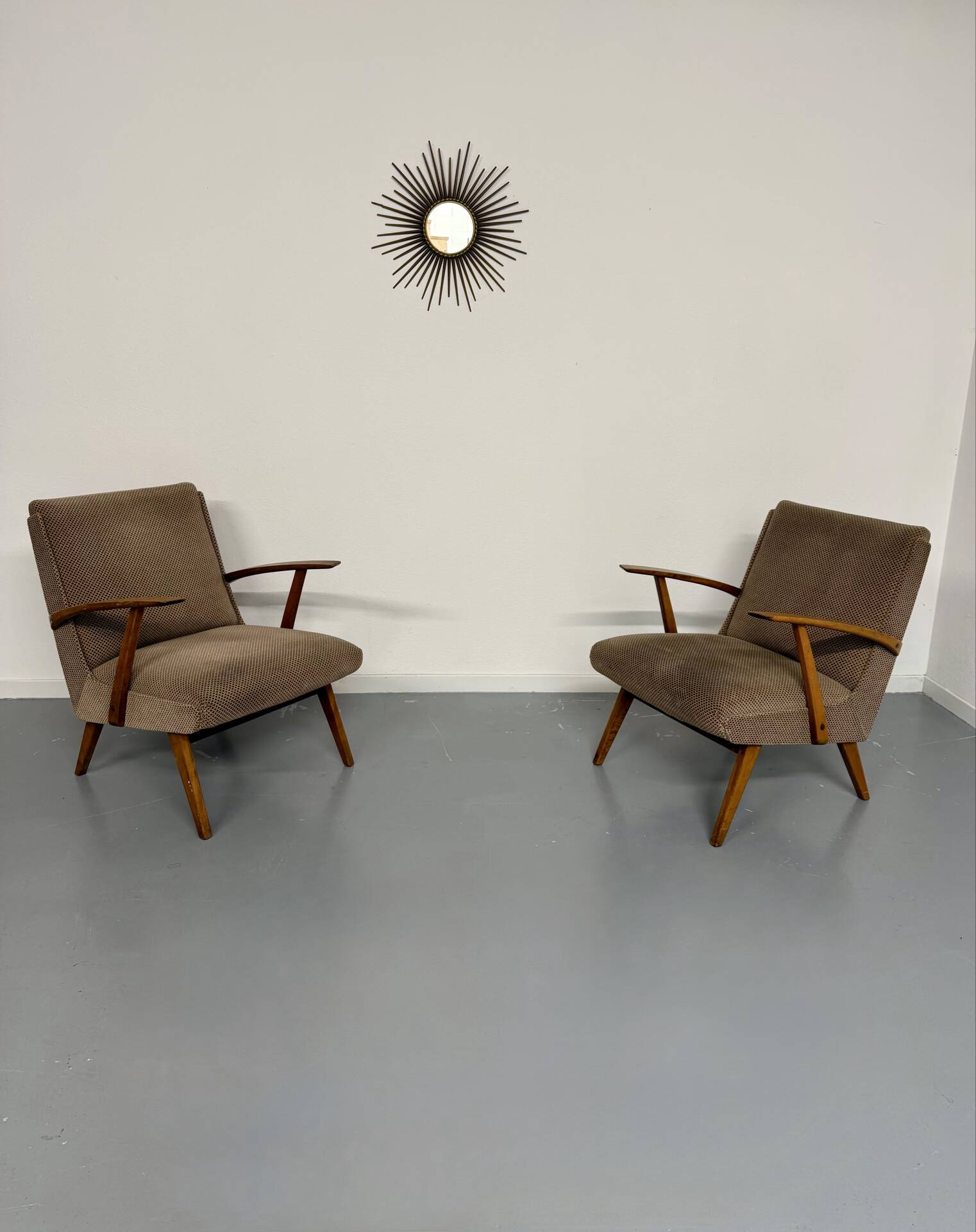 Set of 2 vintage wooden and fabric armchairs designed in the 1960s.