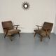 Set of 2 vintage wooden and fabric armchairs designed in the 1960s.