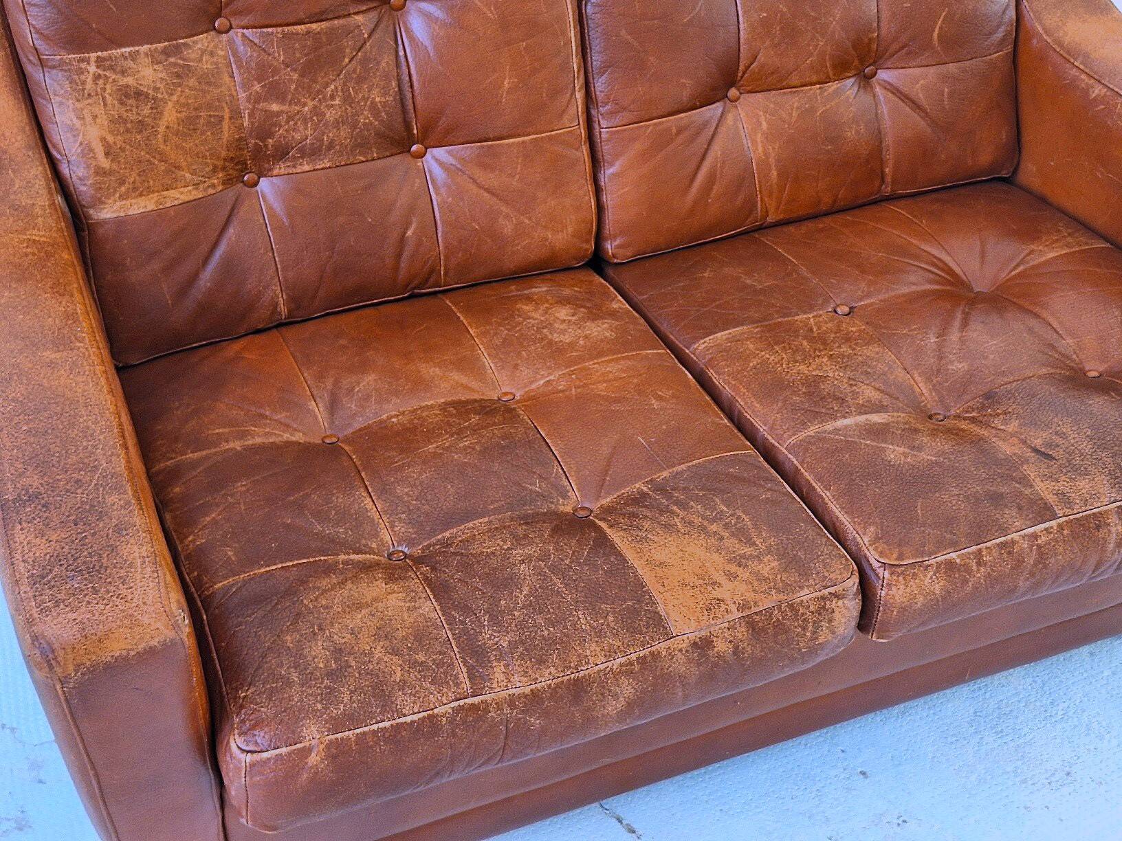 Mid century patchwork tufted patinated leather sofa, 1960s