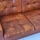 Mid century patchwork tufted patinated leather sofa, 1960s