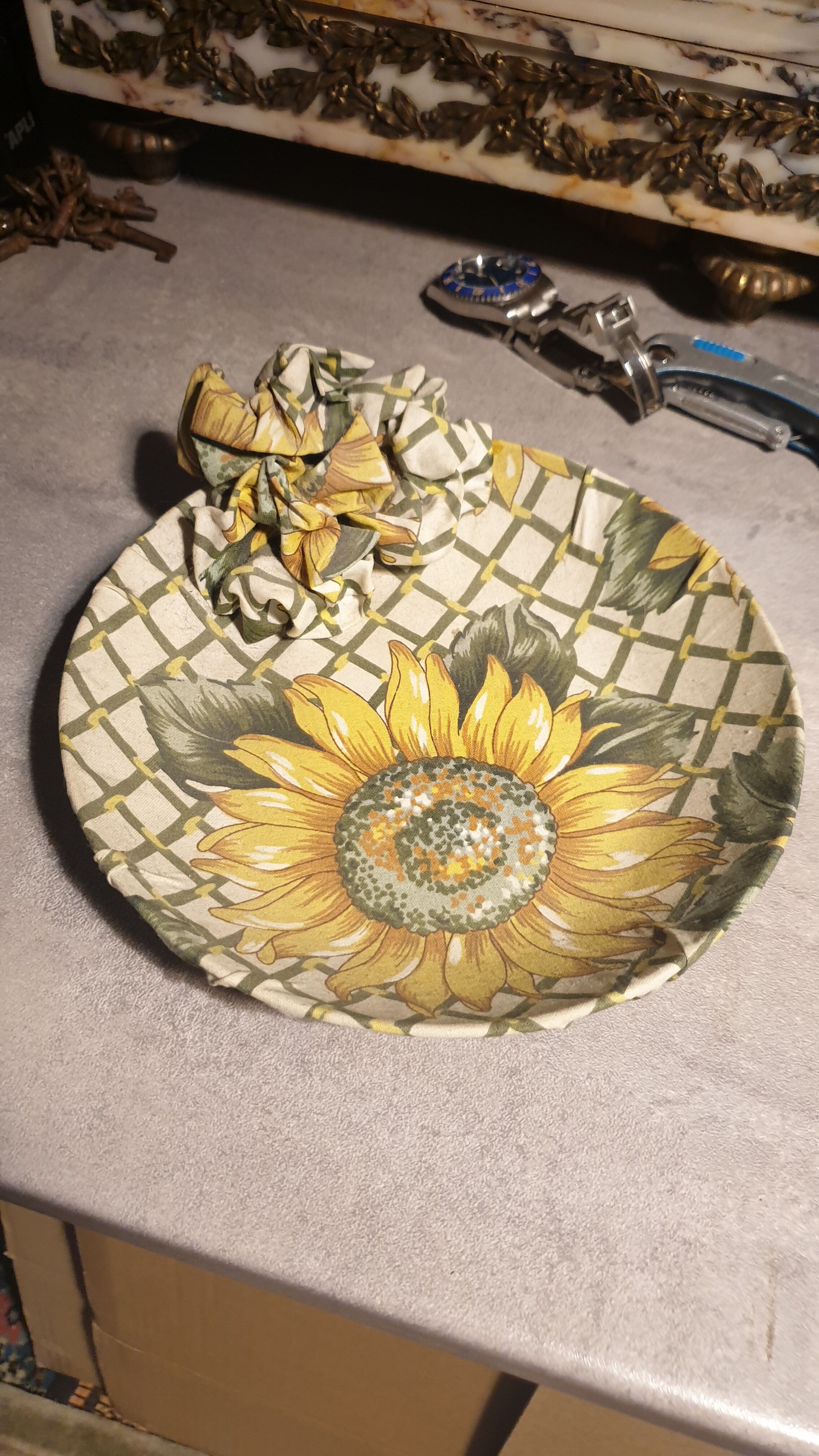 Vase and ceramic cup in fabrics