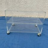 Table basse/ meuble tu en plexiglas vintage sur roulettes