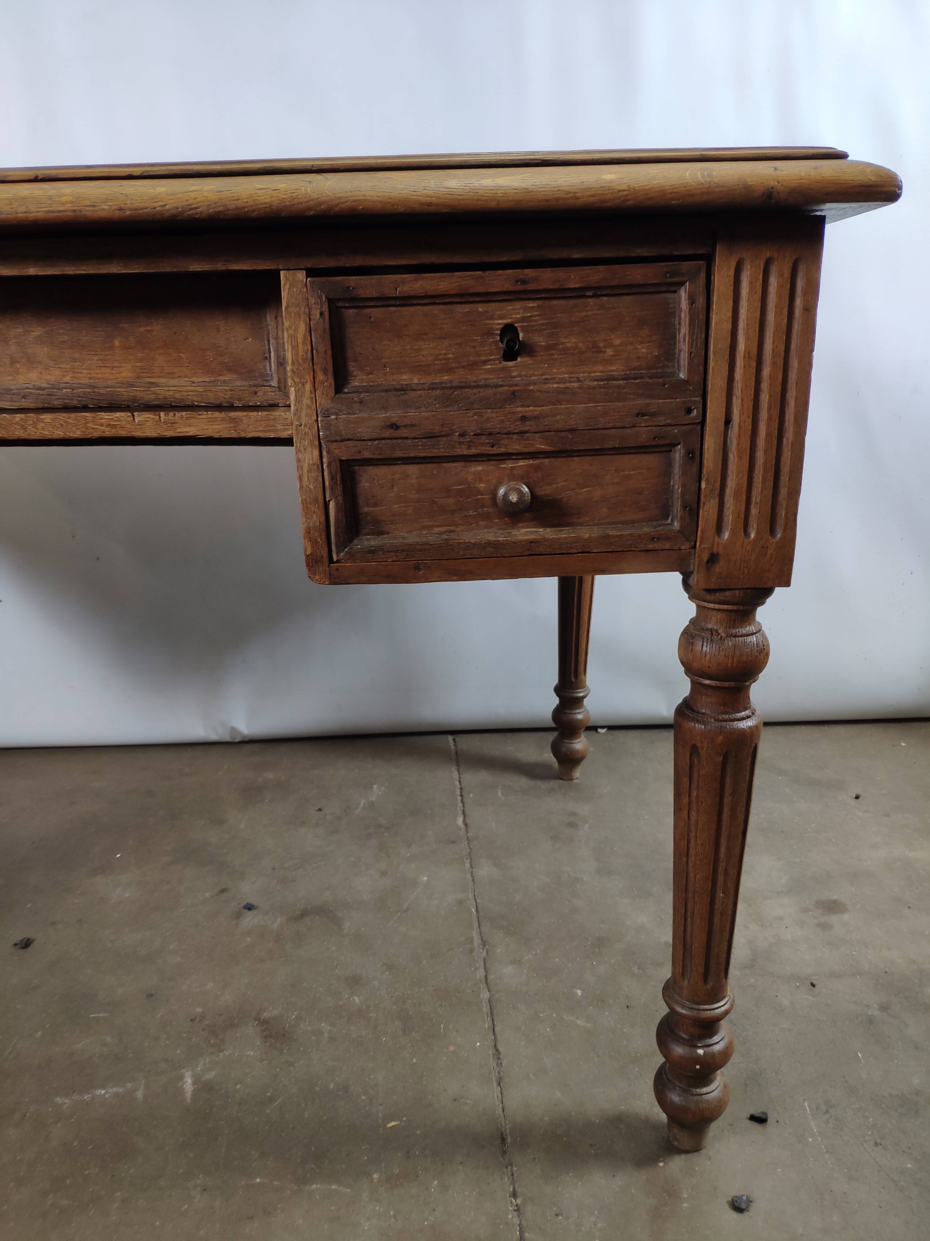 Bureau en bois 5 tiroirs