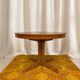 Round table with central base from the 1960s by Baumann.
