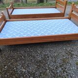 Pair of beds with twin box springs attributed to Maison Regain elm burl