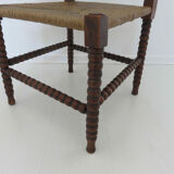 Corner chair in turned wood and straw