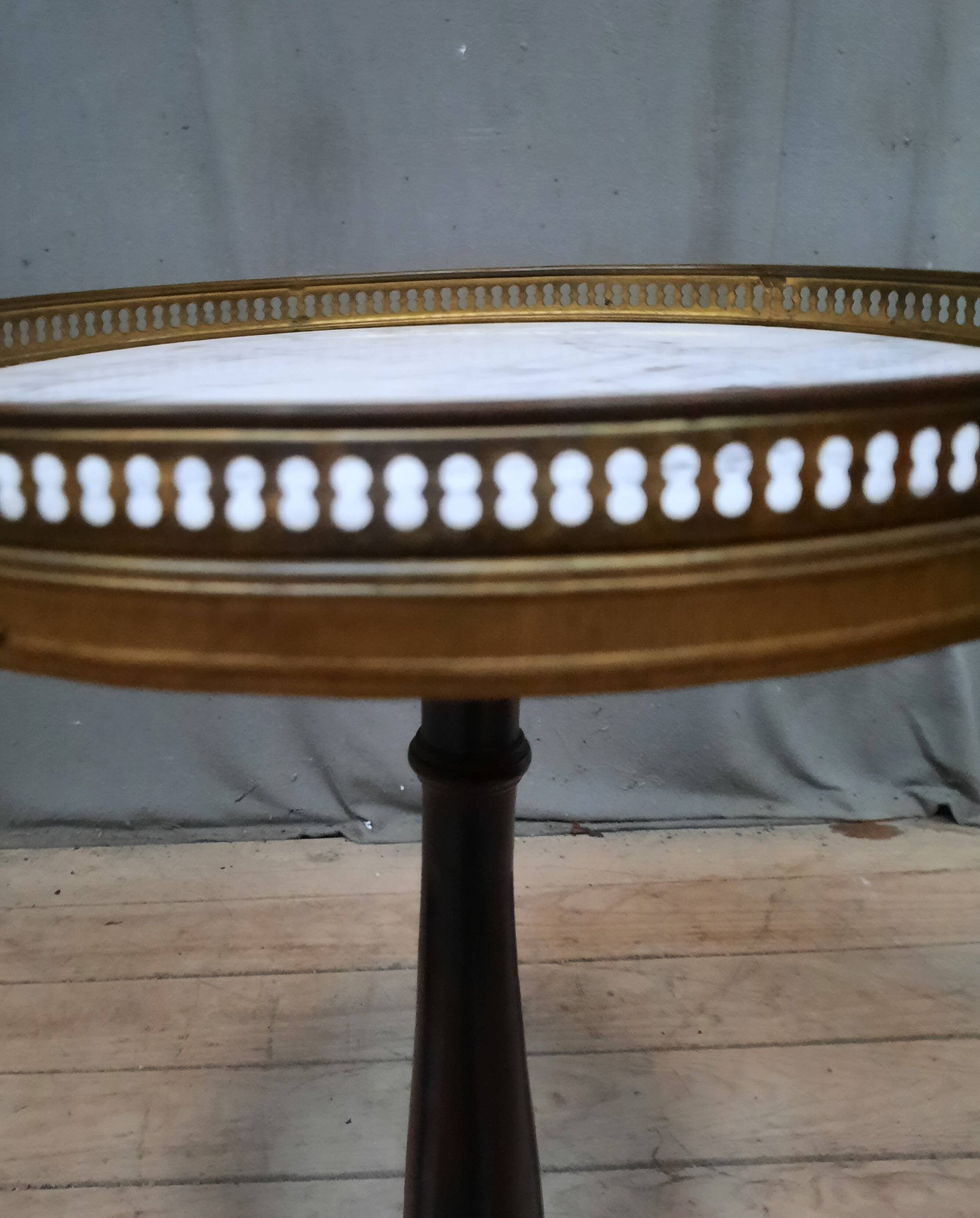 Small marble top pedestal table