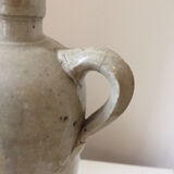 Antique grey stoneware bottle with vintage handle