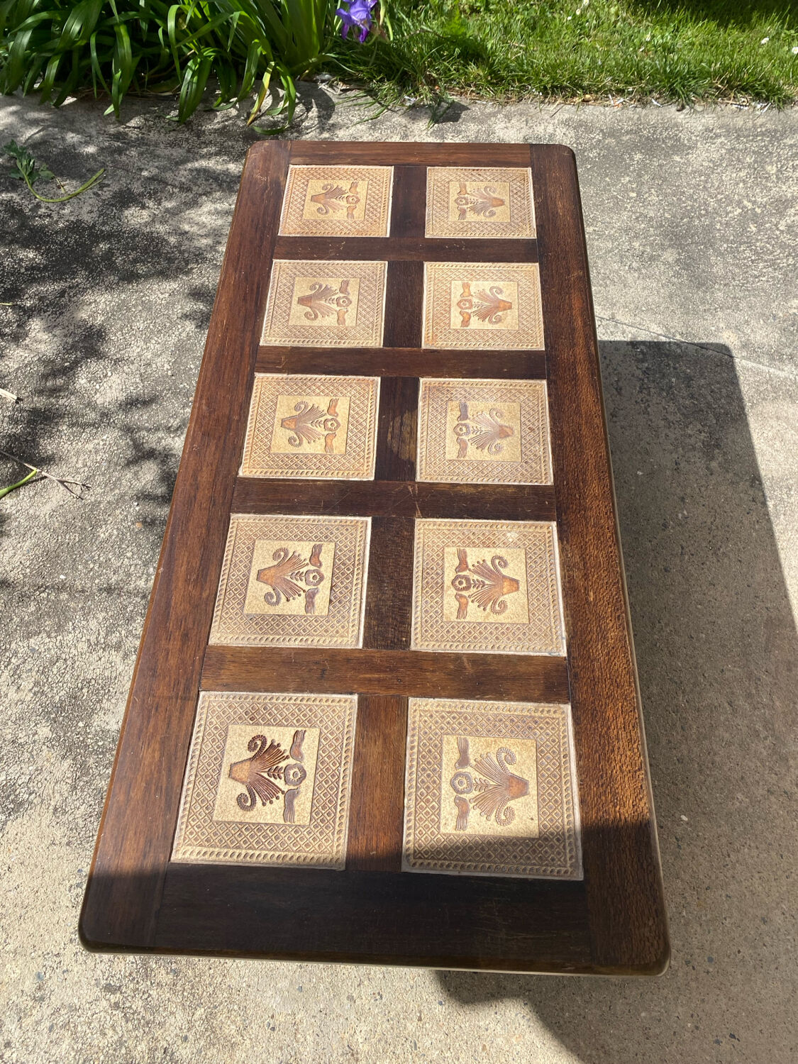 Vintage 60s coffee table with tile decoration of birds and flowers.