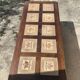 Vintage 60s coffee table with tile decoration of birds and flowers.