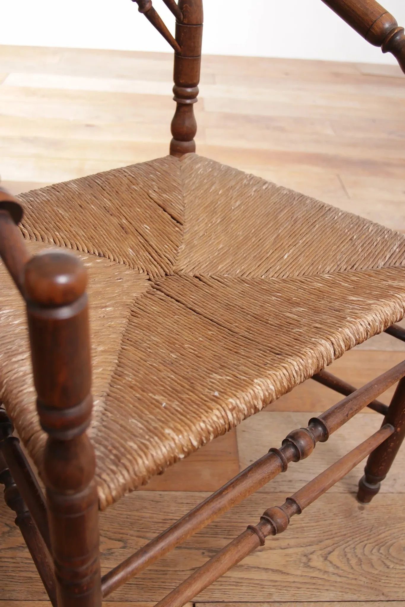 Rare antique Dutch oak armchair with rush seat