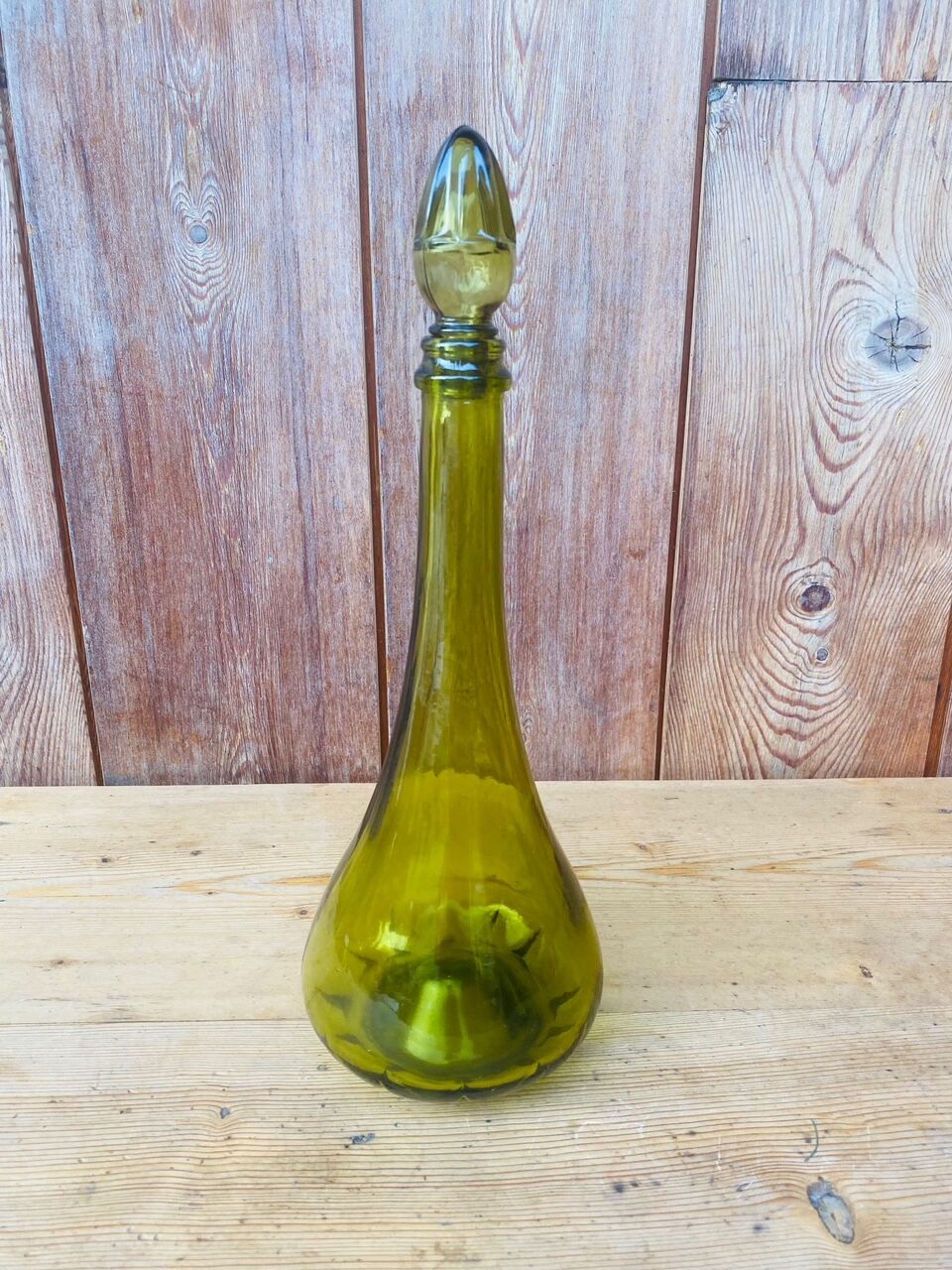 Duo of Italian decanter in green glass.