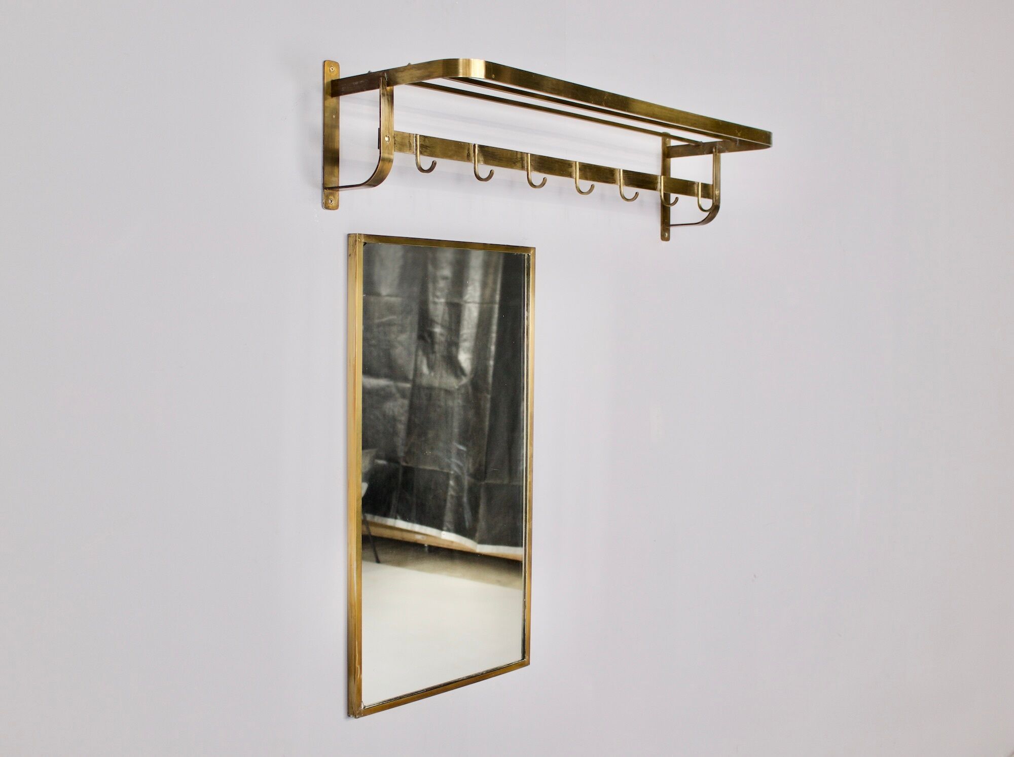 Vereinigte Werkstätten, brass cloakroom and mirror