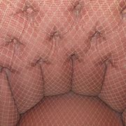 Fauteuil crapaud vintage capitonné en tissu vieux rose