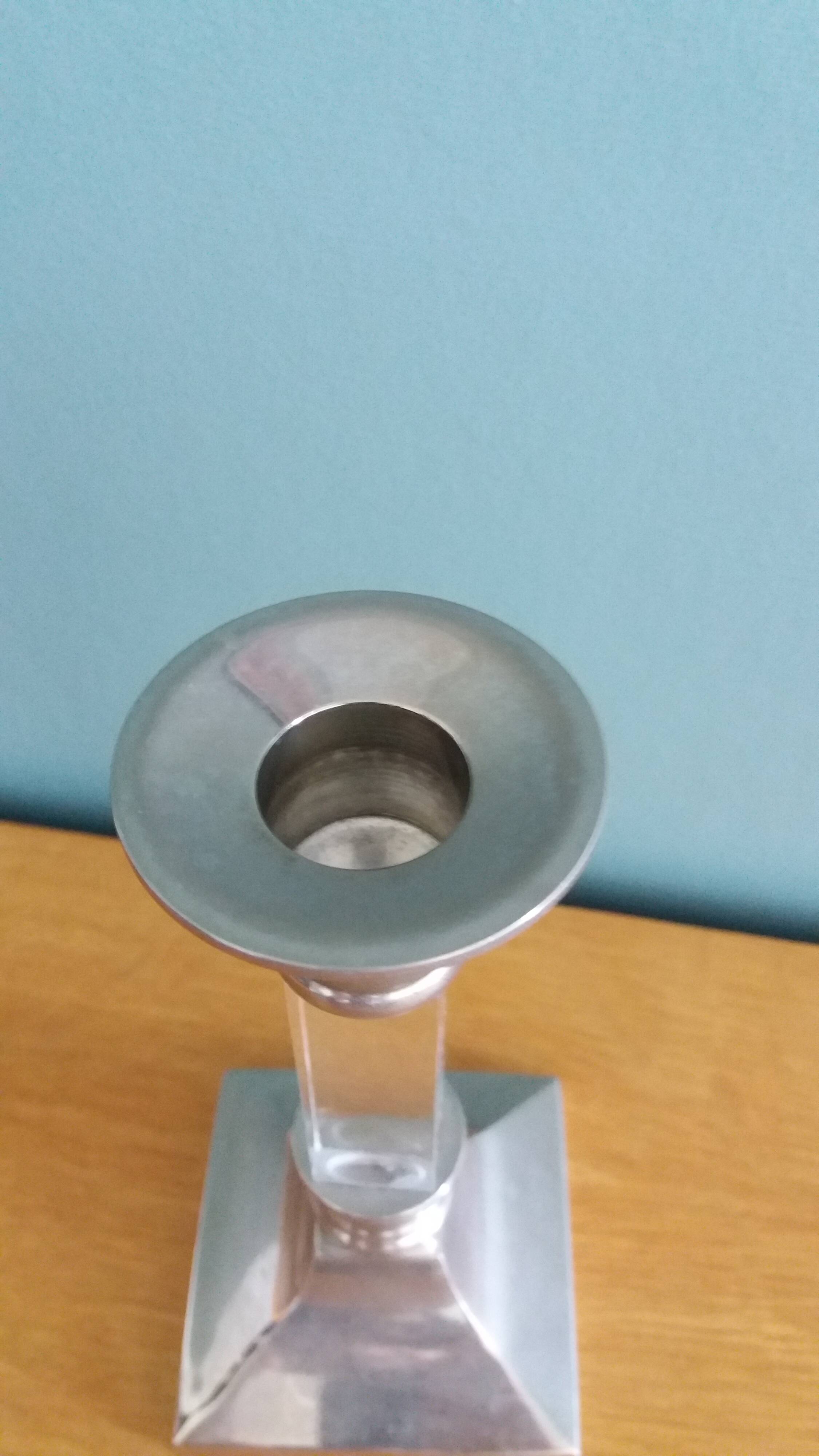 Silver-plated metal candlestick and lucite plexiglass