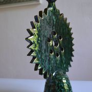 Green ceramic sun candlestick from Tamegroute, Morocco.