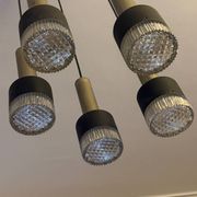 Vintage cascading chandelier from the 60s-70s in black metal and brass