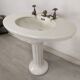 Porcelain sink basin on pedestal