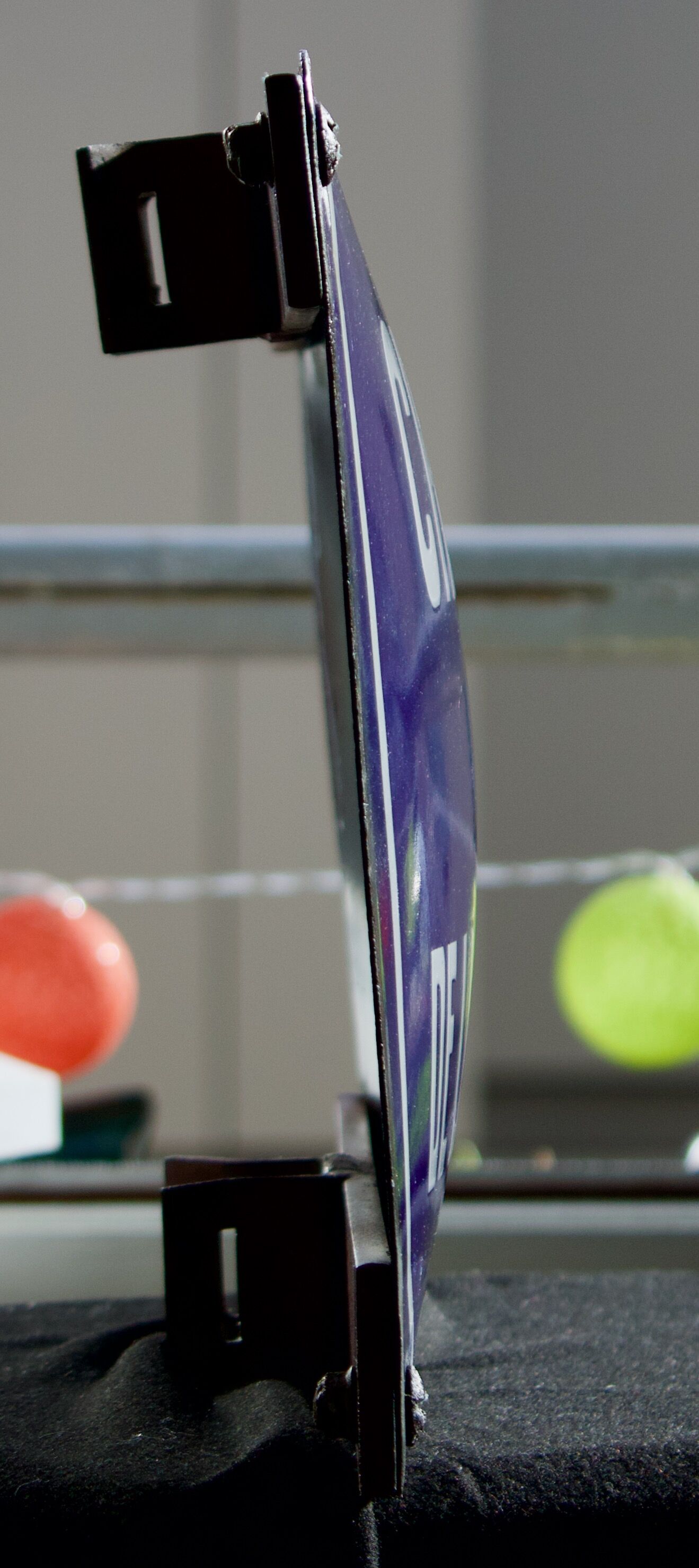 Old Enamelled and bulging "Chemin de la Rente" street plate, in perfect condition, on its cast iron support