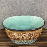 Large planter in colored slip with antique decoration