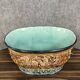 Large planter in colored slip with antique decoration