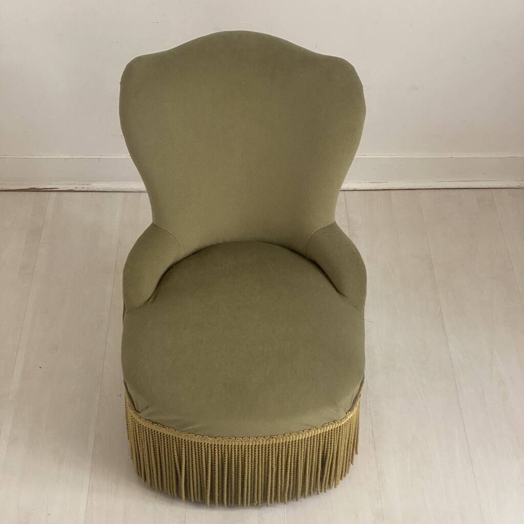 Small green velvet tub chair