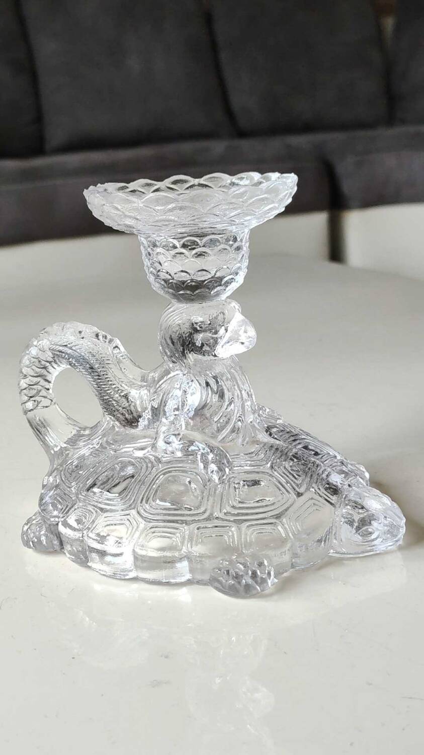 Pair of hand candlesticks/glassware from Portieux/Vallerysthal. In molded glass. Zoomorphic form of turtle carrying a griffin on its back.