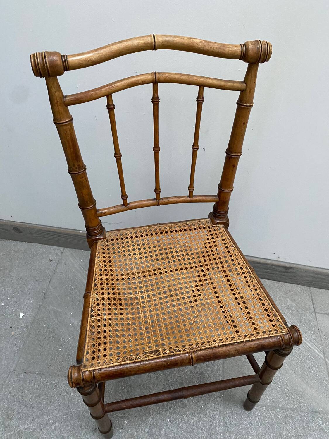 Old bamboo imitation cane chair