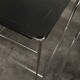 Set of 3 minimalist X line chairs by Niels Jorgen Haugesen.