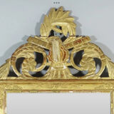 Beautiful Louis XVI style mirror in wood and gilded stucco. Nineteenth