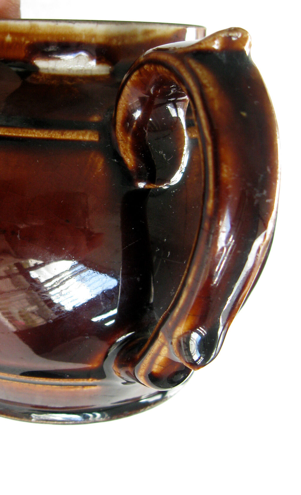 Old brown glazed ceramic coffee pot