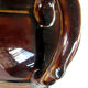 Old brown glazed ceramic coffee pot