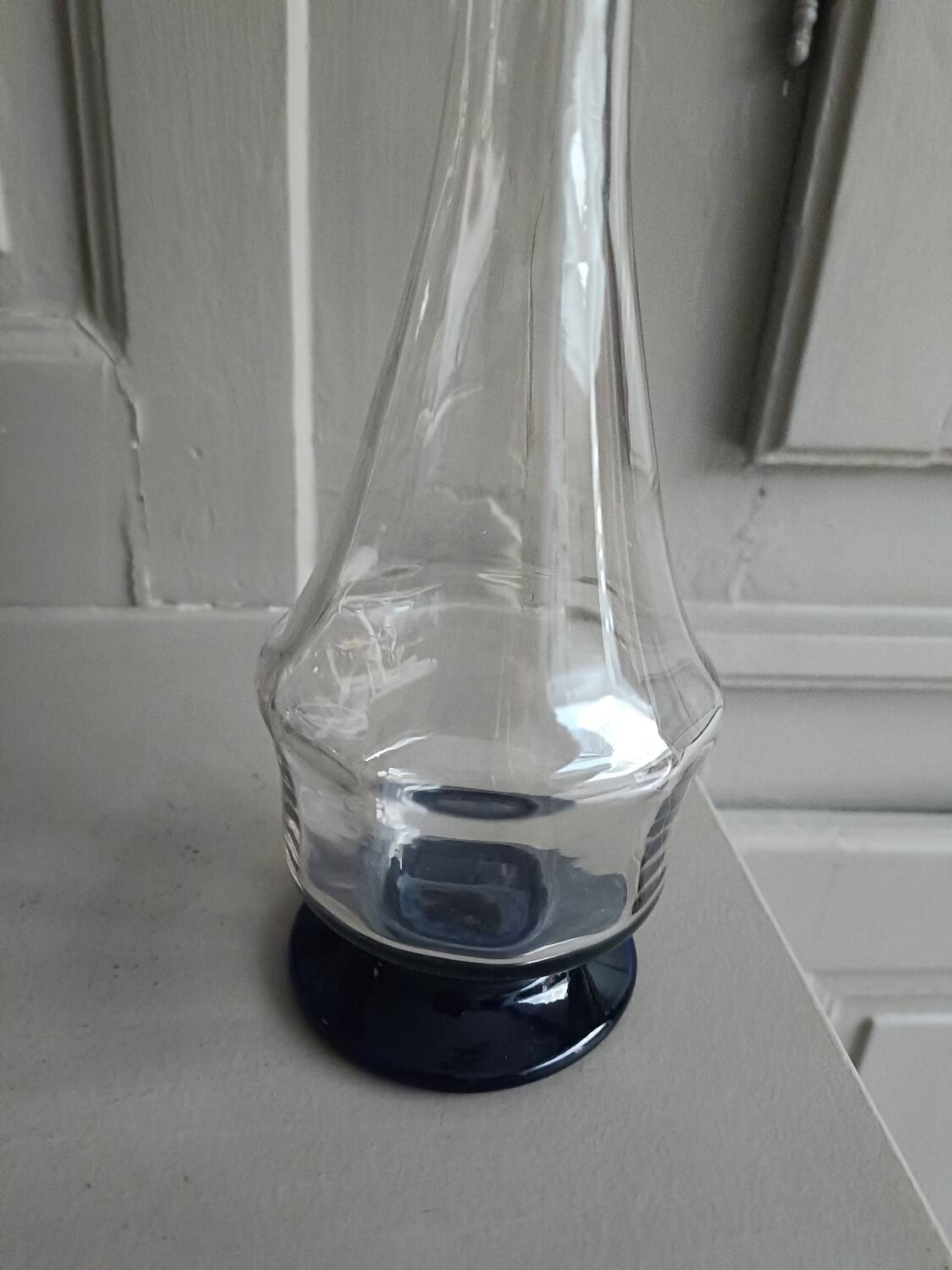 White and blue blown glass carafe