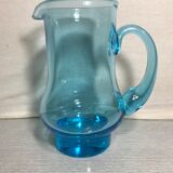 Old blue blown glass pitcher with vintage handle