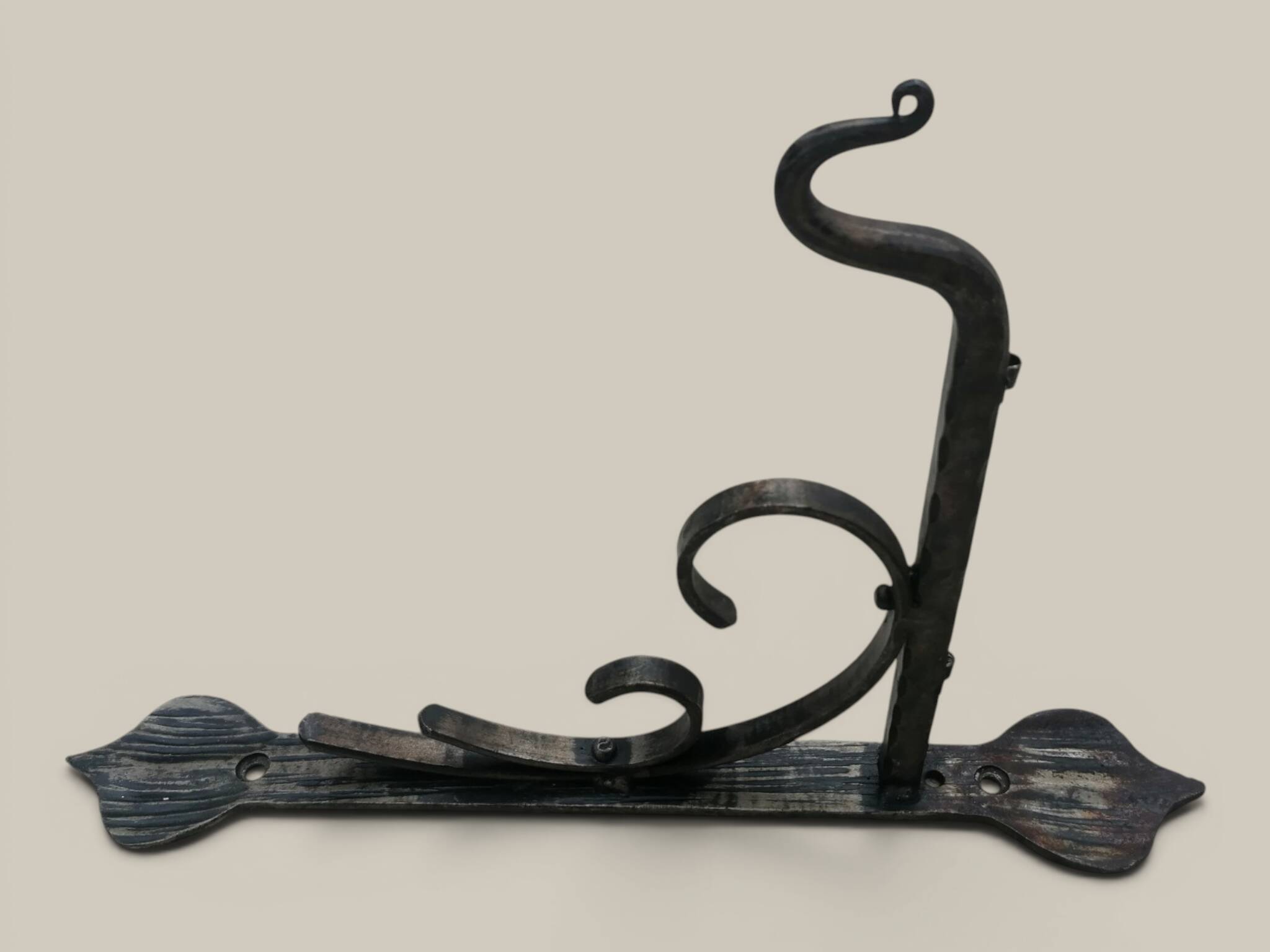 Black wrought iron lantern with stained glass. Medieval, Gothic decoration.