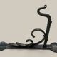 Black wrought iron lantern with stained glass. Medieval, Gothic decoration.
