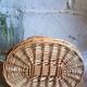 Covered rattan basket for lunch on 50s grass