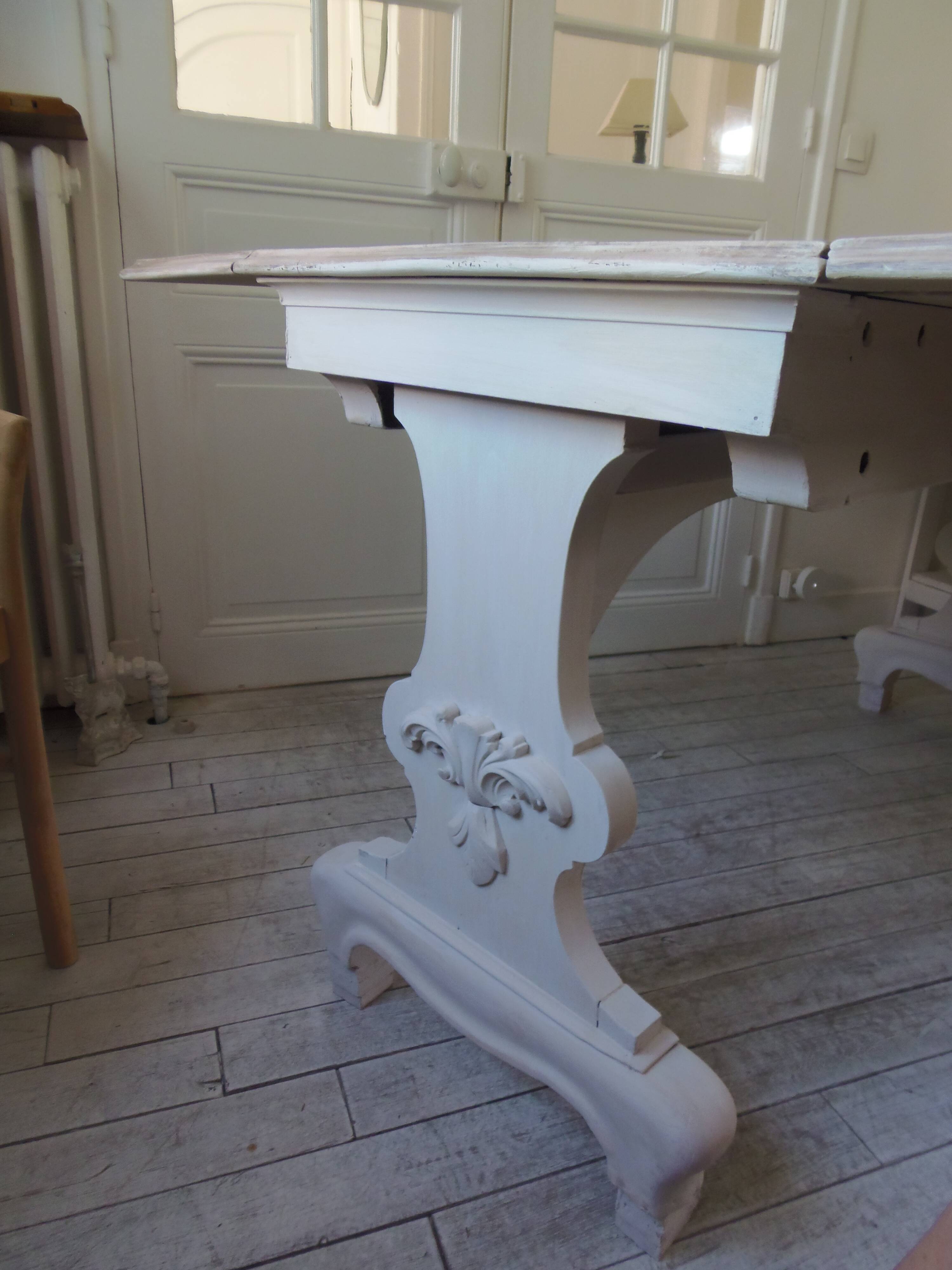 Console, solid walnut table with drop leaves.
